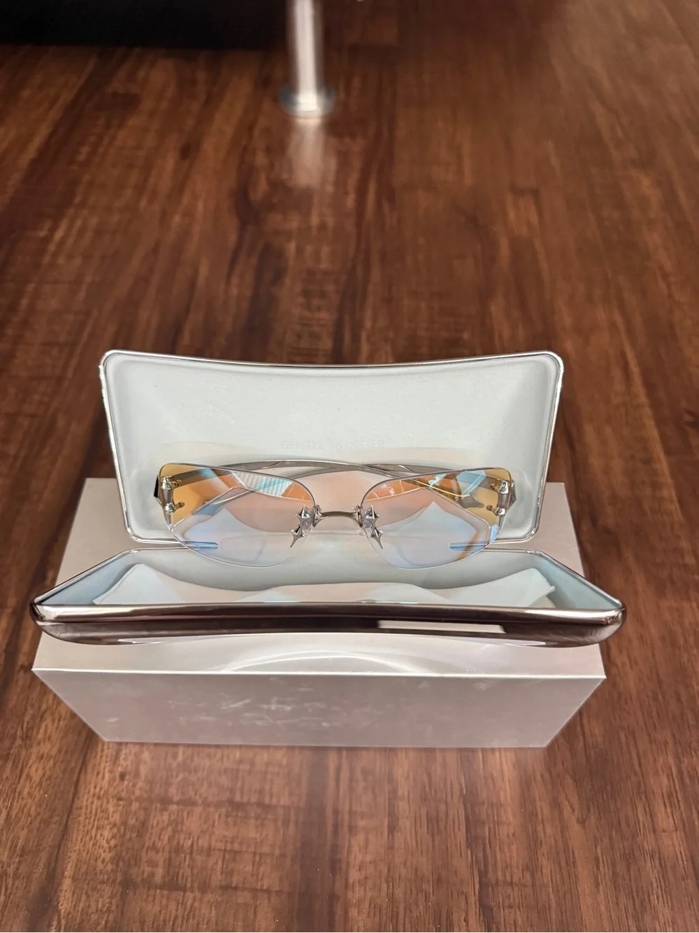 GENTLE MONSTER Silver Frame Sunglasses with Blue Mirrored Lenses